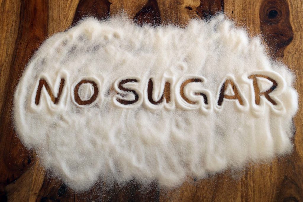 No sugar in Zucker geschrieben, auf Holz